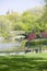 Lake in Central Park in Spring with Dakota Apartments in background, New York City, New York