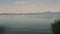 Lake Chiemsee in Bavaria with boats and Alp mountains during summer