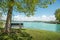 Lake Chiemsee with tree and bench