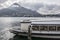 Lake Como and touristic boat, city of Lecco, Italy.