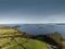 Lake Corrib, county Galway Ireland, Sunny day with clean blue sky and green fields separated by stone fences, islands in the lake