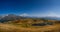 Lake Coruldi with a clear sky at the foot of the mountain. Upper Svaneti, Mestia, Georgia. High Caucasian ridge. Panorama