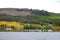 Lake, cottages, forest and mountain