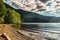 Lake Crescent beach on a sunny and cloudy day, Olympic National Park, Washington state, USA