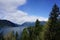 Lake Cushman with clouds and tress