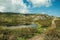 Lake from dam in a rocky terrain on highlands