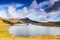 Lake in a desolate mountain landscape