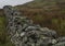 Lake District, Cumbria, England - autumn on a cloudy day, a stone fence.