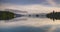 Lake District sunrise landscape time lapse at Lake Windermere. 4k timelapse of perfect reflection o