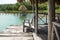 Lake dock with chair, El Remate, Guatemala