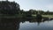 Lake with ducks and houses