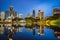 Lake in the evening, near by Twin Towers with city on background. Kuala Lumpur, Malaysia