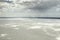 Lake Eyre Salt Flats South Australia aerial with dramatic storm clouds and rainfall