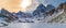 Lake Fiorenza covered with ice on the slopes of Monviso