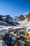 Lake Fiorenza covered with ice on the slopes of Monviso