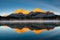 Lake and forest in a mountain valley at dawn.Reflections on the surface of the lake. Wedge Pond, Banff National Park, Alberta, Can