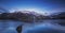 Lake in the French Alps. reflection of the snowy mountains in autumn