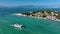 LAKE GARDA, ITALY - APRIL, 2023: Aerial view of a coastline of Lake Garda. drone shot of lake near city and mountains