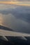 Lake Garda and winglet on sunset view from airplane porthole