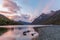 Lake Gunn at sunrise with beautiful sun rays, Fiordland, New Zealand