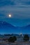 Lake homes mountain and full moon in Daybreak Utah