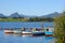 :Lake Hopfensee with scenic views of the Allgau and Tirol Alps