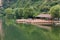 Lake house with pier and woods