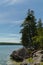 Lake Huron shoreline blue green water and limestone rocks along