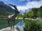 Lake Jasna and mountain goat statue closeup in Kranjska Gora, Slovenia