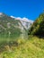 Lake Koenigssee with rocks and trees in the Berchtesgaden Alps, Germany