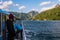 Lake Komani, Albania - May 18, 2017: Onboard morning Lake Komani ferry from Fierza to Koman in Albania - people on deck