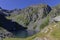 The lake, Lac de Crop surrounded by a huge mountain circus