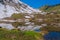 Lake Lac Lioson in Switzerland surrounded by mountains and snow