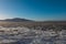 The lake landscape of Musov Czech Republic. View of Lake Musovske and Palava in the Czech Republic. Ice floes in the foreground.