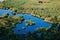 Lake landscape with shimmering waters, picturesque shoreline, serene surroundings, and stunning reflections. Nature photography,