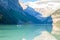 Lake louise canoas with tourists in summer