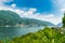 Lake Lugano, Campione d`Italia, Italy. View of the small town, famous for its casino, and Lake Lugano on a beautiful summer day
