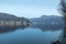 Lake Lugano between Ponte Tresa and Porto Ceresio Italy. View towards the Switzerland, Morcote village, Monte San Giorgio