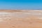 Lake Maclead arid salt lake in Western Australia mirage at horizon
