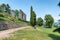 Lake Maggiore, Arona, Italy. Public park and the ruins of the medieval rocca fortress Borromea of Arona above the city