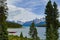 Lake Maligne with red canoes and Rocky Mountains