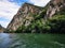 Lake in the Matka canyon - Macedonia. Mountains, emerald water, motor boats