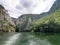 Lake in the Matka canyon - Macedonia. Mountains, emerald water, motor boats.