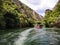 Lake in the Matka canyon - Macedonia. Mountains, emerald water, motor boats