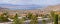 Lake Meade Bolder City Nevada suburb and mountains panorama.