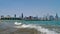 Lake Michigan Waves Breaking Under Boardwalk. Slow Motion View. Chicago Downtown