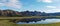 Lake with mirrored mountains Iceland Panorama