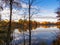 Lake and mirroring trees in fall/autumn.