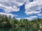 Lake Montferrand with emerald water and pleasure catamarans in the Ruskeala Mountain Park on a sunny summer day