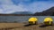 Lake Motosu, a green lake with two yellow kayaks on the shore